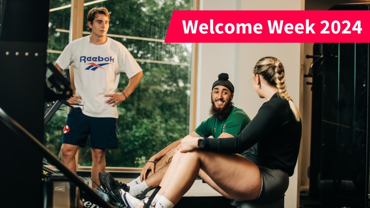 Image of gym members talking with red banner and text reading welcome week 2024