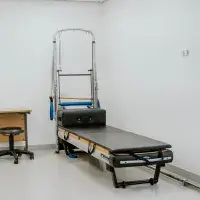 Pilates equipment in room
