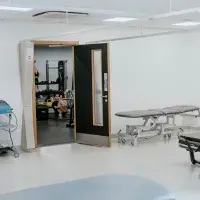 physio room leading into gym space