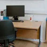 office space with computer screen