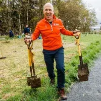 Director of Sport & Exercise carrying spades 