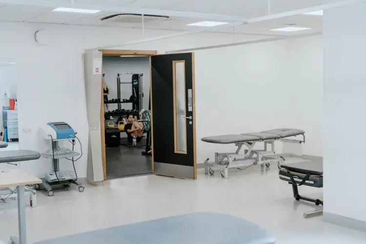 physio room leading into gym space