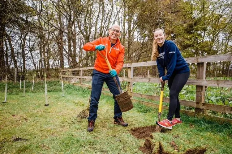 Sport & Exercise Director planting trees at Easter Bush 